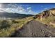 Scenic hiking trail with views of mountains and the cityscape at 19067 W 57Th Dr, Golden, CO 80403