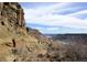 Picturesque mountain trail with hikers enjoying scenic views and blue skies at 19067 W 57Th Dr, Golden, CO 80403