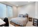 Comfortable bedroom with natural light and a simple, modern design at 1333 Elati St # 3, Denver, CO 80204