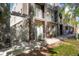 Chic townhome featuring private entrances, balconies, and modern design, enhanced by manicured landscaping at 1333 Elati St # 3, Denver, CO 80204