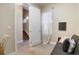 Home office featuring a couch, chair, and a view of the stairs, offering a versatile and functional workspace at 1333 Elati St # 3, Denver, CO 80204