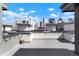 Spacious rooftop deck offering city views, ideal for outdoor entertaining at 1333 Elati St # 3, Denver, CO 80204