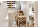 Modern staircase with wood treads, metal railings and lots of natural light at 1333 Elati St # 3, Denver, CO 80204