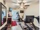 Well-equipped exercise room with a ceiling fan, sliding glass doors, and various workout machines for a healthy lifestyle at 7273 Silverhorn Dr, Evergreen, CO 80439
