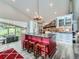 Spacious kitchen with a large island, stainless steel appliances, and a dining area, perfect for Gathering meals and gatherings at 7273 Silverhorn Dr, Evergreen, CO 80439
