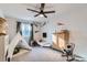 Charming bedroom featuring a teepee, dresser, and rocking chair at 14942 E Evans Ave, Aurora, CO 80014