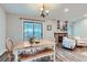 Charming dining area with wooden table and access to a patio at 14942 E Evans Ave, Aurora, CO 80014