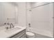 Well-lit bathroom features a vanity with a sink and a bathtub with a shower at 3166 Newfound Lake Rd, Berthoud, CO 80513