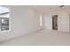Spacious bedroom with bright white walls, carpet flooring and natural light at 3166 Newfound Lake Rd, Berthoud, CO 80513