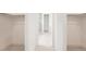 Walk-in closet and ensuite bathroom with glass shower at 3166 Newfound Lake Rd, Berthoud, CO 80513