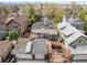 A charming aerial view shows the home, solar panels and backyard at 1518-1520 S Sherman St, Denver, CO 80210