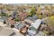 An aerial view of the neighborhood, showcasing tree-lined streets and well-maintained homes at 1518-1520 S Sherman St, Denver, CO 80210