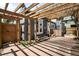Inviting backyard patio featuring a pergola with climbing vines, brick pavers, and a cozy outdoor setting at 1518-1520 S Sherman St, Denver, CO 80210