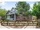 Charming gray duplex featuring a welcoming front porch, landscaped yard, and mature trees in a desirable neighborhood at 1518-1520 S Sherman St, Denver, CO 80210