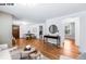 Spacious living room features hardwood floors, fresh paint and an open floor plan at 1518-1520 S Sherman St, Denver, CO 80210