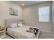 Cozy bedroom with a comfortable bed, side tables, and soft lighting from a window at 2785 Black Hawk Pl, Brighton, CO 80601