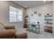 Comfortable office space with a desk, chair, and shelving units for storage and display at 2785 Black Hawk Pl, Brighton, CO 80601