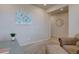 Interior view of an office with a decorative floral painting on the wall at 2785 Black Hawk Pl, Brighton, CO 80601