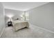 Cozy bedroom with soft carpeting, natural light, and serene atmosphere at 3311 Klondike Pl, Castle Rock, CO 80108