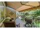 Inviting deck with grill and awning, creating a cozy outdoor living space at 3311 Klondike Pl, Castle Rock, CO 80108