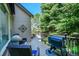 Relaxing deck area with comfortable seating and a grill, perfect for outdoor entertaining at 3311 Klondike Pl, Castle Rock, CO 80108