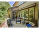 Cozy deck with grill and outdoor seating area, perfect for enjoying outdoor living at 3311 Klondike Pl, Castle Rock, CO 80108
