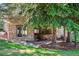 Exterior view of house showing outdoor stone patio with hot tub at 3311 Klondike Pl, Castle Rock, CO 80108