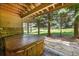 Covered hot tub on a stone patio, perfect for relaxation and outdoor enjoyment at 3311 Klondike Pl, Castle Rock, CO 80108