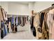 Spacious walk-in closet with ample hanging space and neutral carpeting at 3311 Klondike Pl, Castle Rock, CO 80108