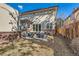 Inviting backyard featuring a patio with outdoor furniture, perfect for relaxing and entertaining guests at 325 S High St, Denver, CO 80209