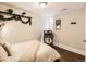 Cozy bedroom with natural light, desk, and stylish decor accents at 325 S High St, Denver, CO 80209