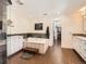A lavish main bathroom featuring a soaking tub, tiled accents, and a connected walk-in closet at 325 S High St, Denver, CO 80209