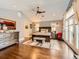 Spacious main bedroom features hardwood floors, high ceilings, neutral paint, and access to a balcony at 325 S High St, Denver, CO 80209