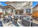 Outdoor patio area with comfortable seating, a fire pit, and attractive landscaping at 325 S High St, Denver, CO 80209