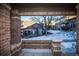 View of the backyard and neighboring townhouses from the patio at 6436 Silver Mesa Dr # E, Highlands Ranch, CO 80130