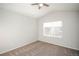 Well-lit bedroom featuring a ceiling fan and neutral walls at 6436 Silver Mesa Dr # E, Highlands Ranch, CO 80130