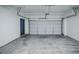 Attached garage with an automatic garage door at 6436 Silver Mesa Dr # E, Highlands Ranch, CO 80130