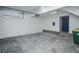 Spacious garage with overhead door and ample storage at 6436 Silver Mesa Dr # E, Highlands Ranch, CO 80130