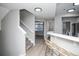 Modern kitchen with stainless steel appliances and white cabinets at 6436 Silver Mesa Dr # E, Highlands Ranch, CO 80130