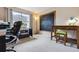 Cozy office space featuring a large black board, warm lighting, and carpeted floors at 10375 Lions Heart, Lone Tree, CO 80124