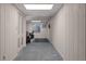 Finished basement area with carpet and white paneled walls at 33 Canongate Ln, Highlands Ranch, CO 80130