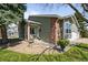 Beautifully landscaped home exterior with a manicured garden, showcasing curb appeal and charm at 33 Canongate Ln, Highlands Ranch, CO 80130
