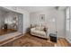 Cozy sitting area with a comfortable couch, rug, and view into an adjacent space at 33 Canongate Ln, Highlands Ranch, CO 80130