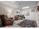 Home office features a desk, a comfy chair, and a floral area rug for a productive workspace at 33 Canongate Ln, Highlands Ranch, CO 80130