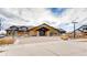 Community clubhouse with stone accents and an inviting entrance at 20370 E 52Nd Ave, Denver, CO 80249