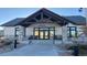 Attractive clubhouse exterior featuring stone accents and a welcoming entrance at 20370 E 52Nd Ave, Denver, CO 80249