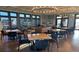 Bright clubhouse interior with stylish furniture, tables, and natural light at 20370 E 52Nd Ave, Denver, CO 80249