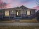 Charming single-story home with stone accents, neutral siding, and covered porch at 20370 E 52Nd Ave, Denver, CO 80249