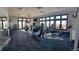 Bright gym with fitness equipment, weights, and ample natural light at 20370 E 52Nd Ave, Denver, CO 80249