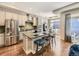 Modern kitchen with granite countertops, stainless steel appliances, and a functional island at 20370 E 52Nd Ave, Denver, CO 80249